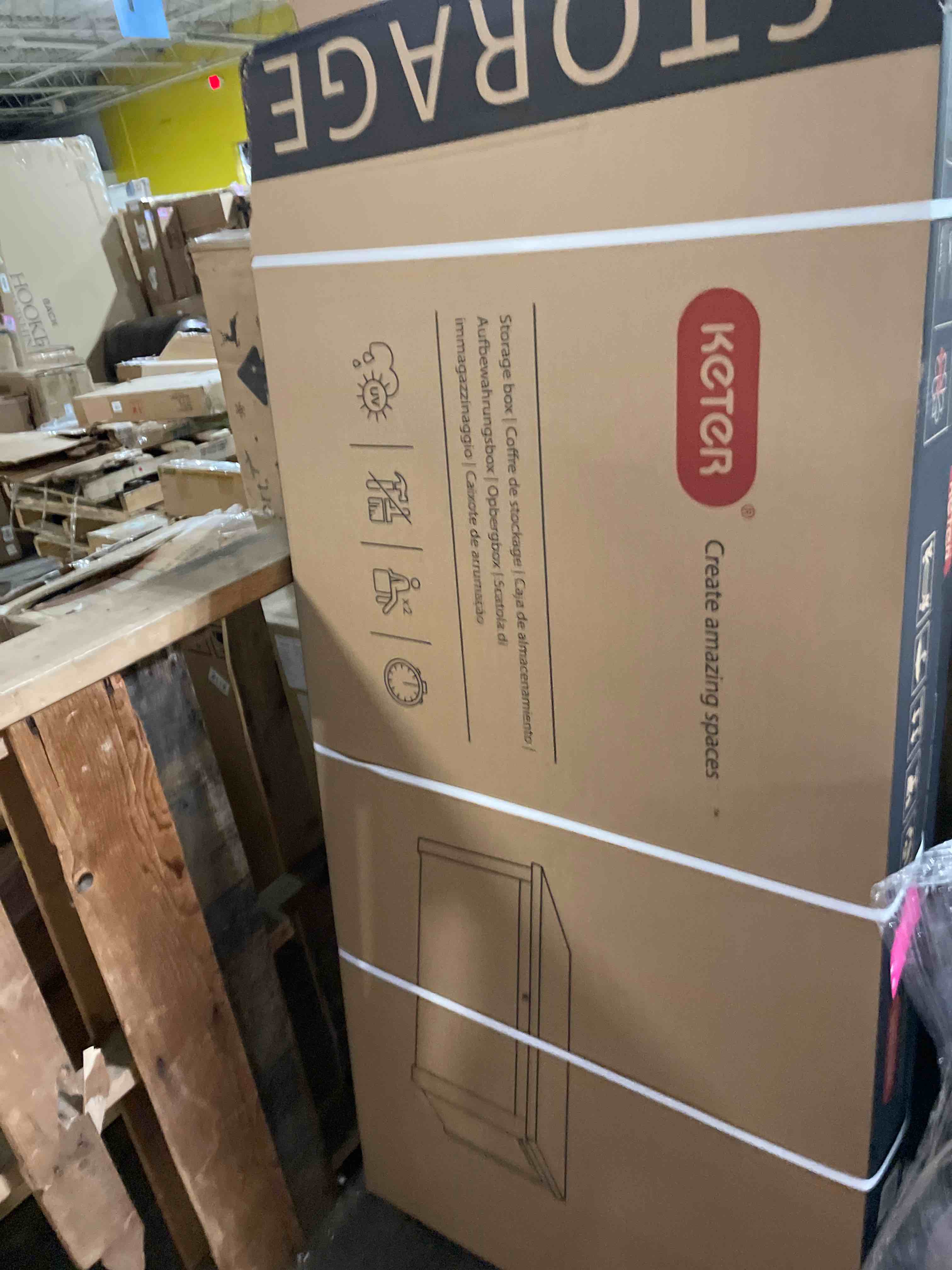 Condition photo showing New/Like New for keter westwood 150 gallon resin large outdoor storage box for patio furniture, outdoor cushions, garden tools and pool floats, dark grey