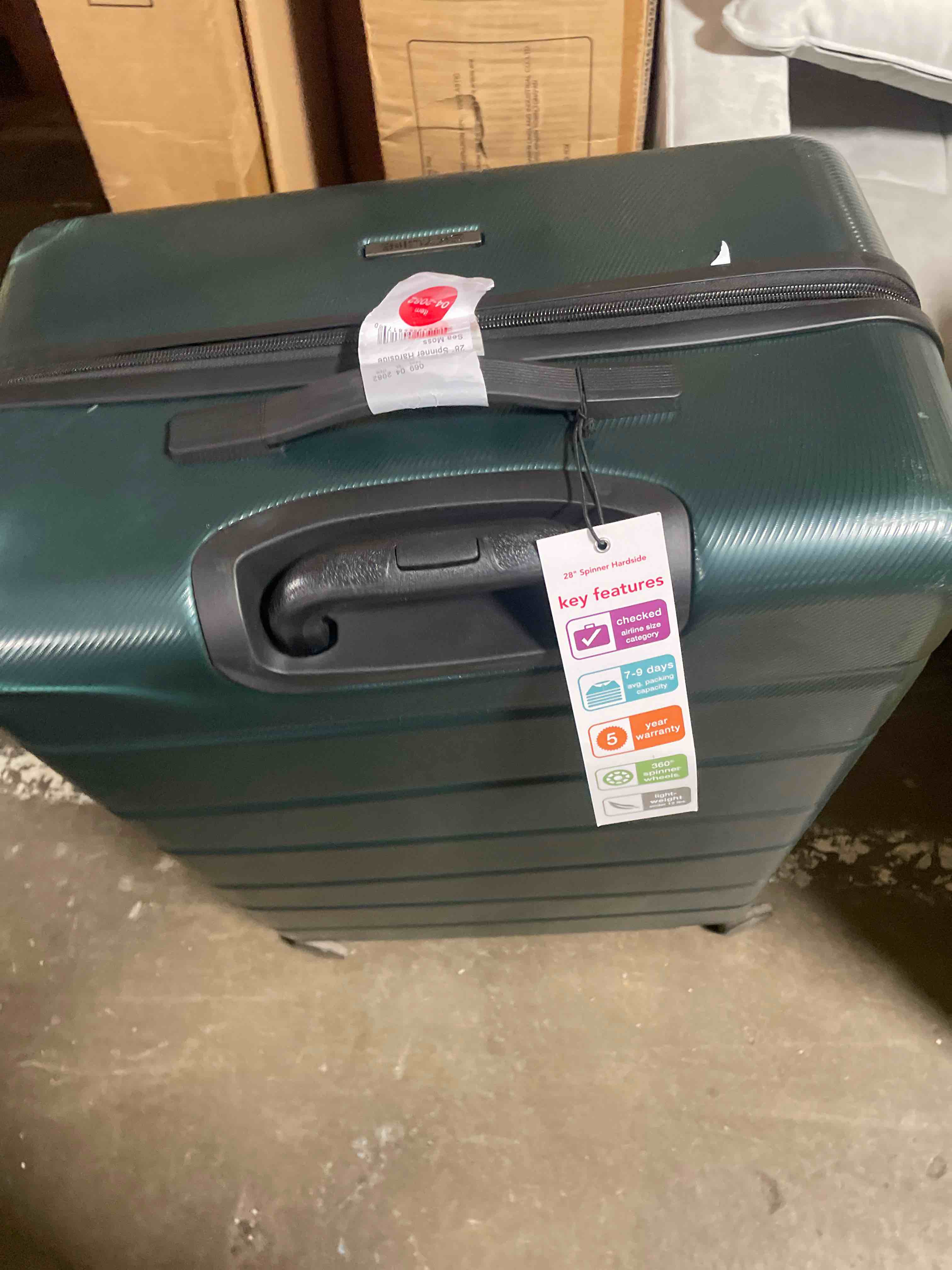 Condition photo showing New/Like New for skyline large checked in spinner wheels suitcase - green