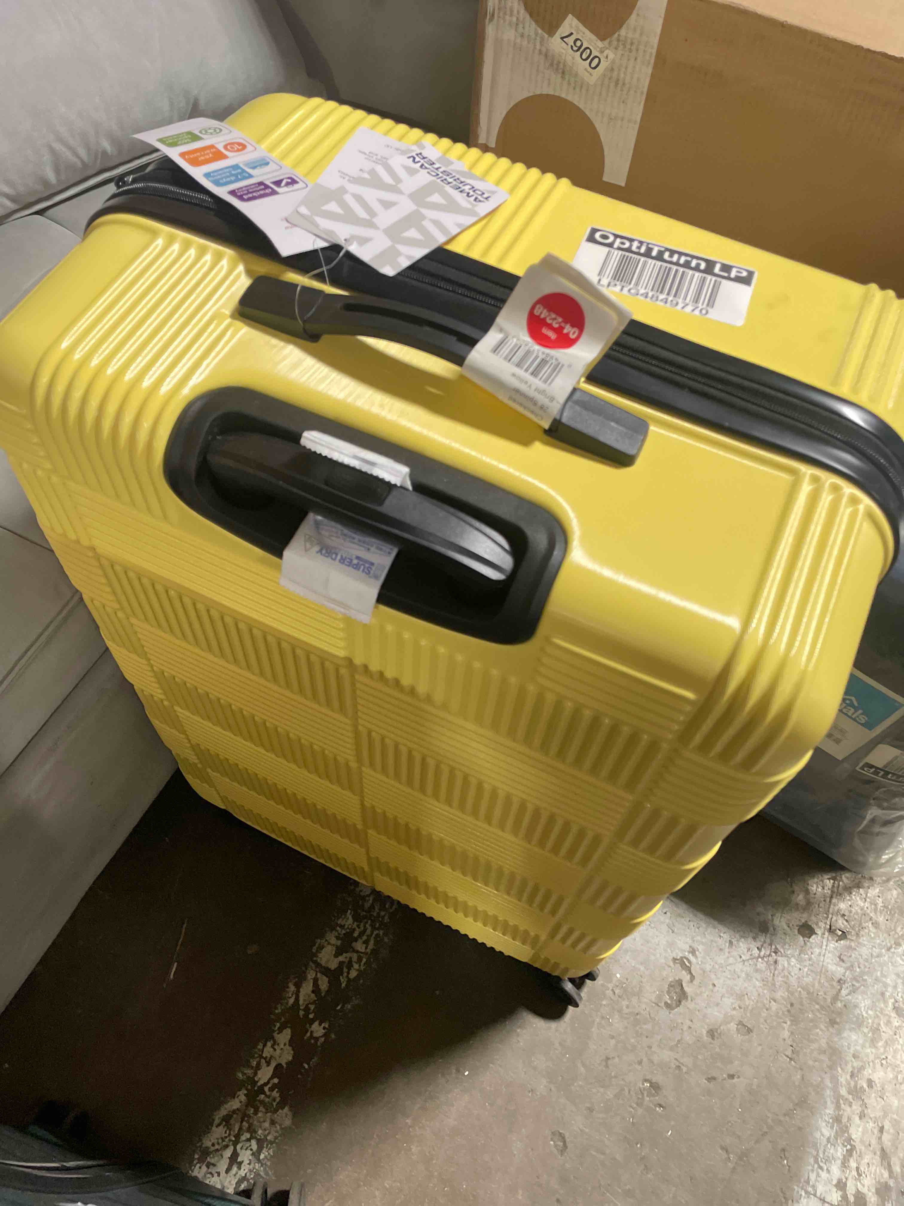 Condition photo showing New/Like New for american tourister nxt hardside large checked spinner suitcase - yellow: 8-wheel durable abs