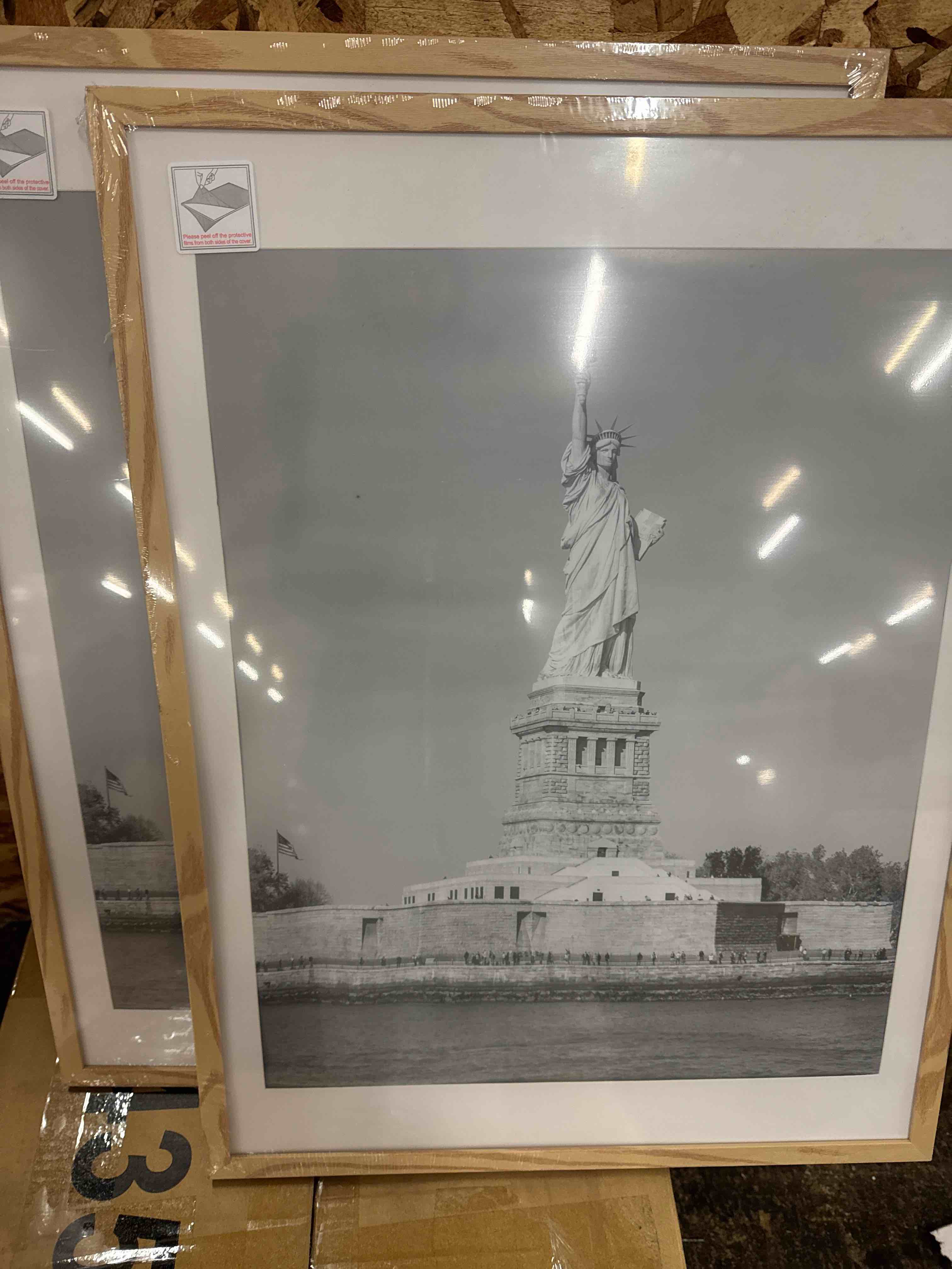Condition photo showing New/Like New for iFrame 18'' x 22'' Light Wood Framed New York City Statue of Liberty Skyline Print Framed Art Work For Wall Decor With Photo Mat | NYC Skyline Wall Art | Black And White Picture Wall Art Decor