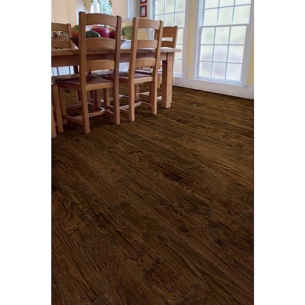 TrafficMaster Saratoga Hickory 7 mm T x 7.6 in. W Laminate Wood Flooring (24.2 sqft/case x 12 Cases = 290.4 Sq. Ft.)BID IS PER SQ FT/290.4