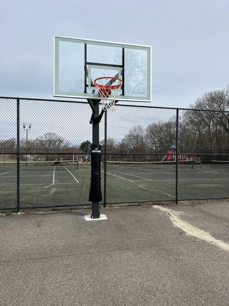 Spalding 54 In. Tempered Glass U-Turn® In-Ground Basketball Hoop