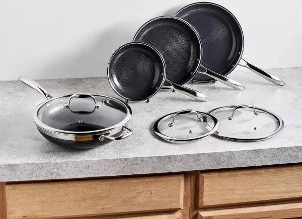 HexClad Hybrid Nonstick 7-Piece Fry Pan Set, 8, 10, and 12-Inch Frying Pans with Tempered Glass Lids, & Woke Stay-Cool Handles, Dishwasher-Friendly, Induction Ready, Compatible with All Cooktops