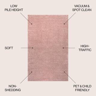 Condition photo showing New/Like New for jonathan y supersoft 9 x 12 area rug, haze - pink, seu100p-9