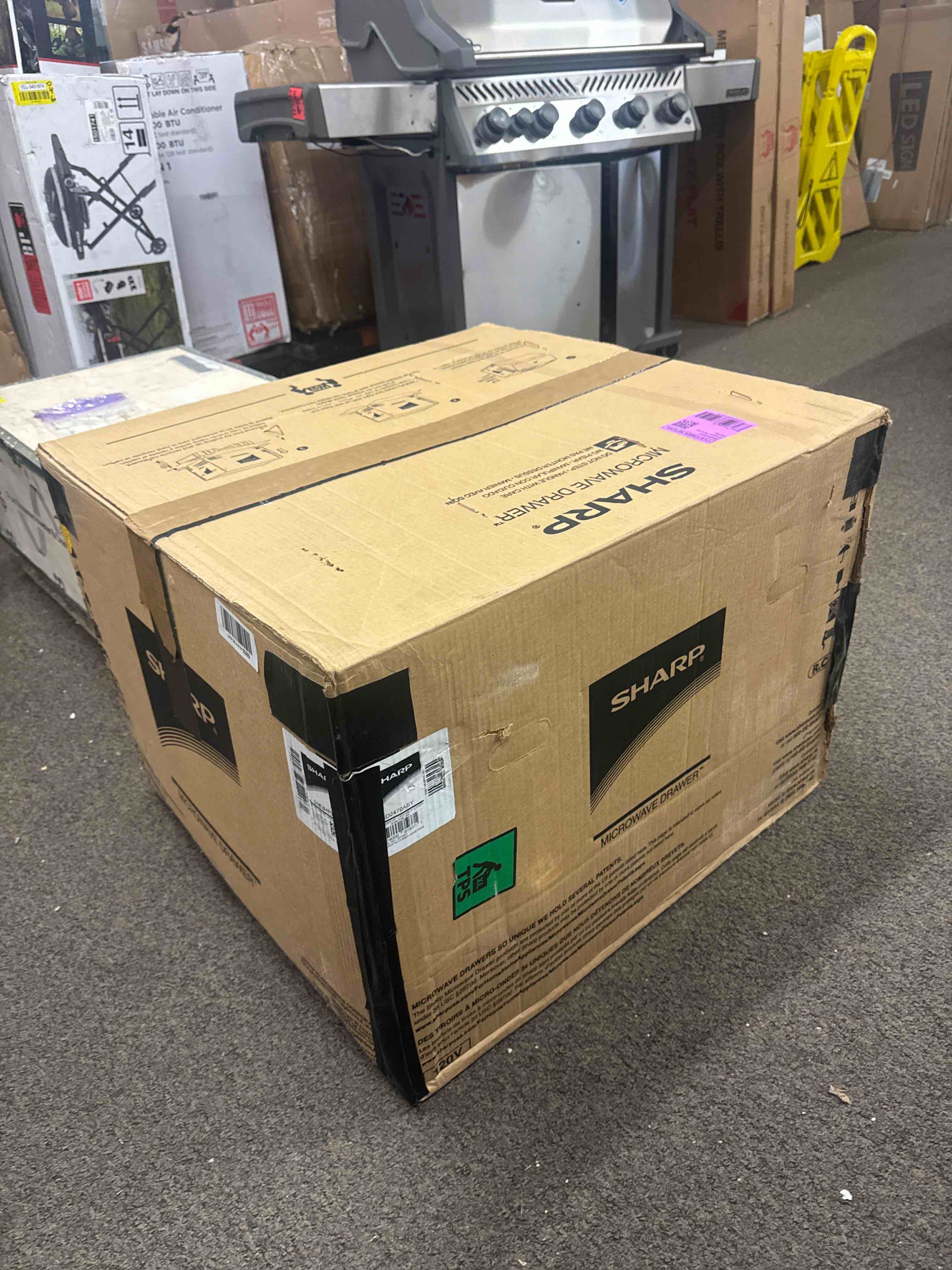 Condition photo showing New/Like New for sharp smd2470asy microwave drawer oven, 24-inch, 1.2 cubic feet, 950 watt, concealed control panel with digital lcd display, stainless steel