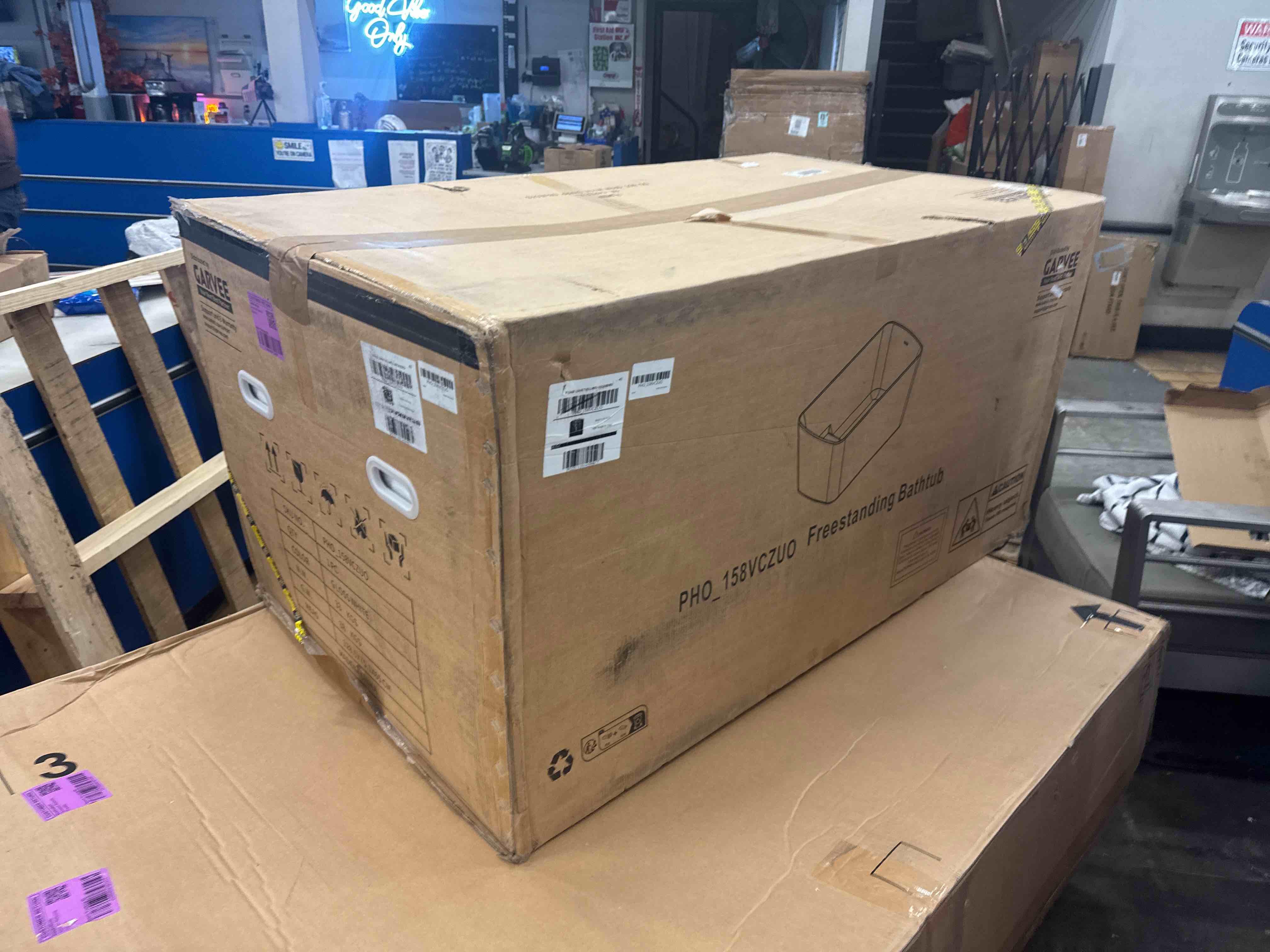 Condition photo showing As Is for rectangular freestanding soaking bathtub 49", japanese style with built-in seat, chrome drain system, r-corner ergonomic design in gloss white (acrylic crack, should be repairable with repair kit - well above normal water line.see photos.)