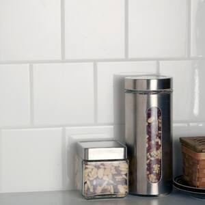 Condition photo showing New/Like New for (41.28 sq. ft.) restore bright white 6 in. x 6 in. ceramic wall tile (12.50 sq. ft. /case) by daltile  (bid is per sq. ft., lot is for 41.28 sq ft total. msrp $1.99 per sq ft.)