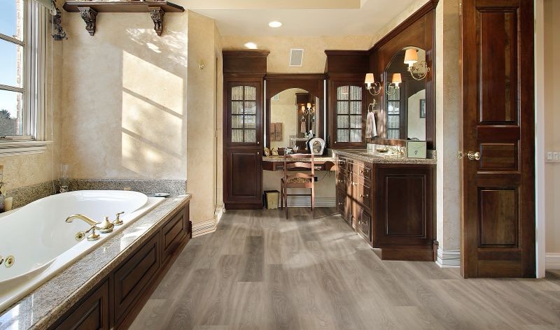 Condition photo showing New/Like New for (244.58 sq ft) chesapeake flooring - 6"x48" essentials spc edgewood rigid waterproof vinyl plank flooring (bid is per sq.ft./ lot is for 244.58 sq ft total. msrp $3.99 per sq ft.)