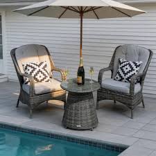 Condition photo showing New/Like New for (4) direct wicker parma outdoor rattan armchairs - set of 2 (pac-009) item pac - 009 - br - kd -pbw2 (bid is per box of 2 chairs, lot is for 2 boxes of 2 chairs each box. 4 chairs total.)