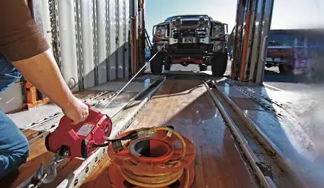 Condition photo showing New/Like New for warn 885005 pullzall corded 120v ac portable electric winch with steel cable: 1/2 ton (1,000 lb) pulling capacity , red (working condition.)