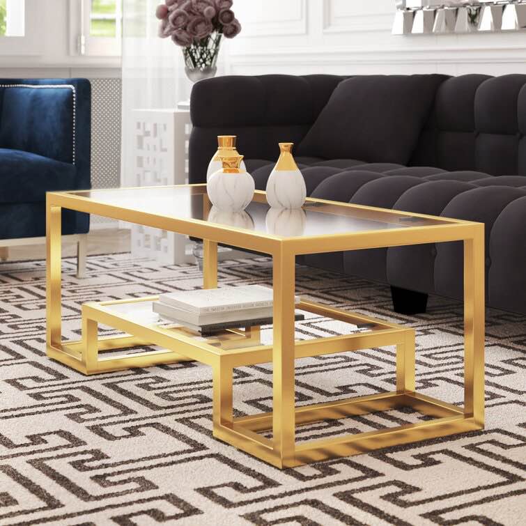 Shatana Nimmons Glass Top Coffee Table By Willa Arlo™ Interiors Size: 16" H x 51" L x 26" D | Color: High Polished Gold (COMPLETE$