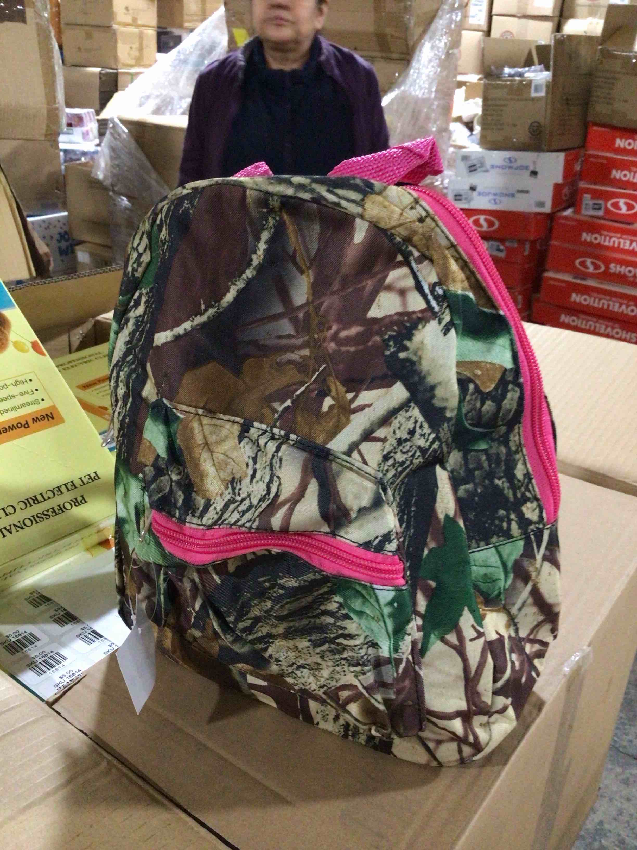 Pink and camo backpack