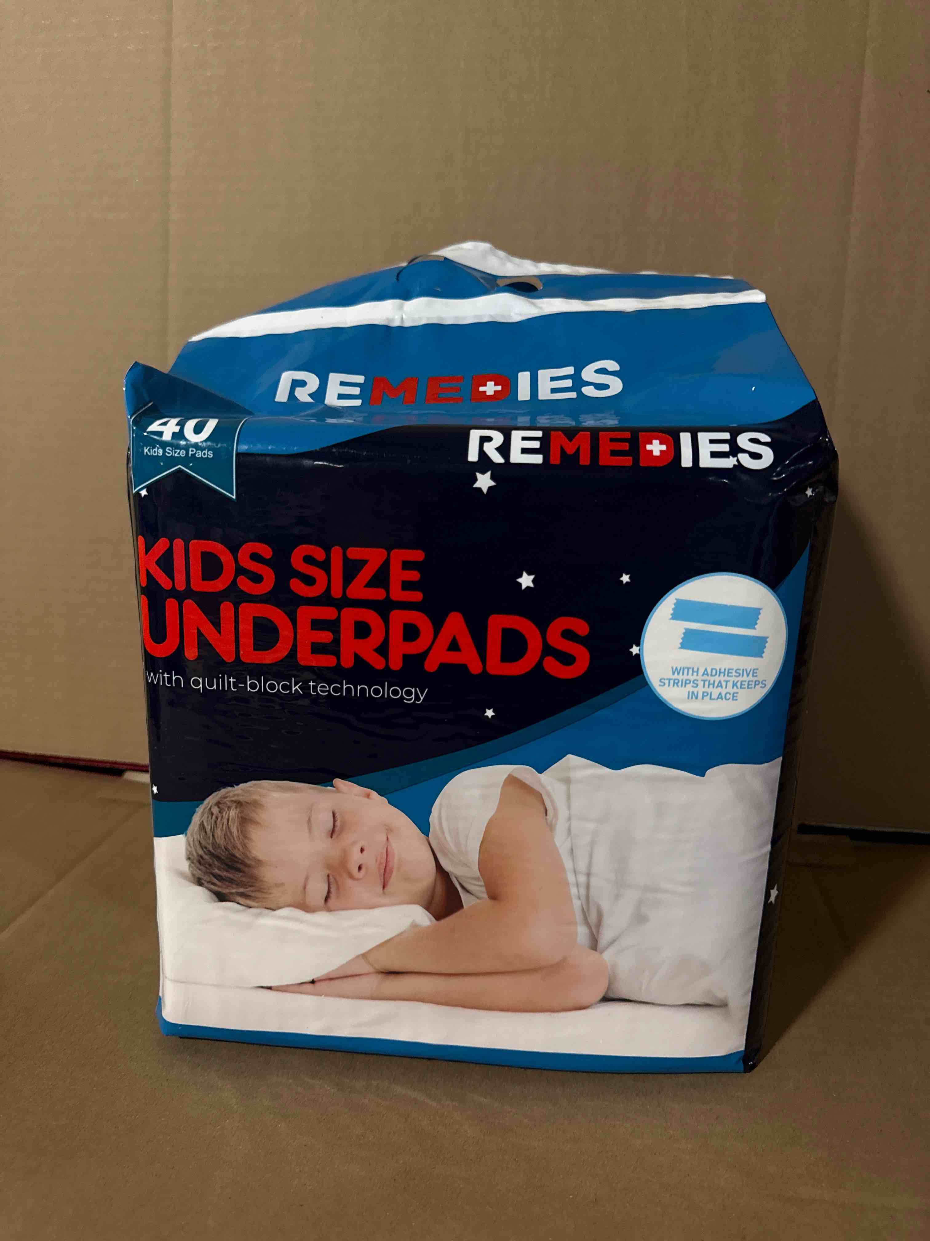 Condition photo showing New/Like New for remedies kids size underpads with adhesive strips 40 count 