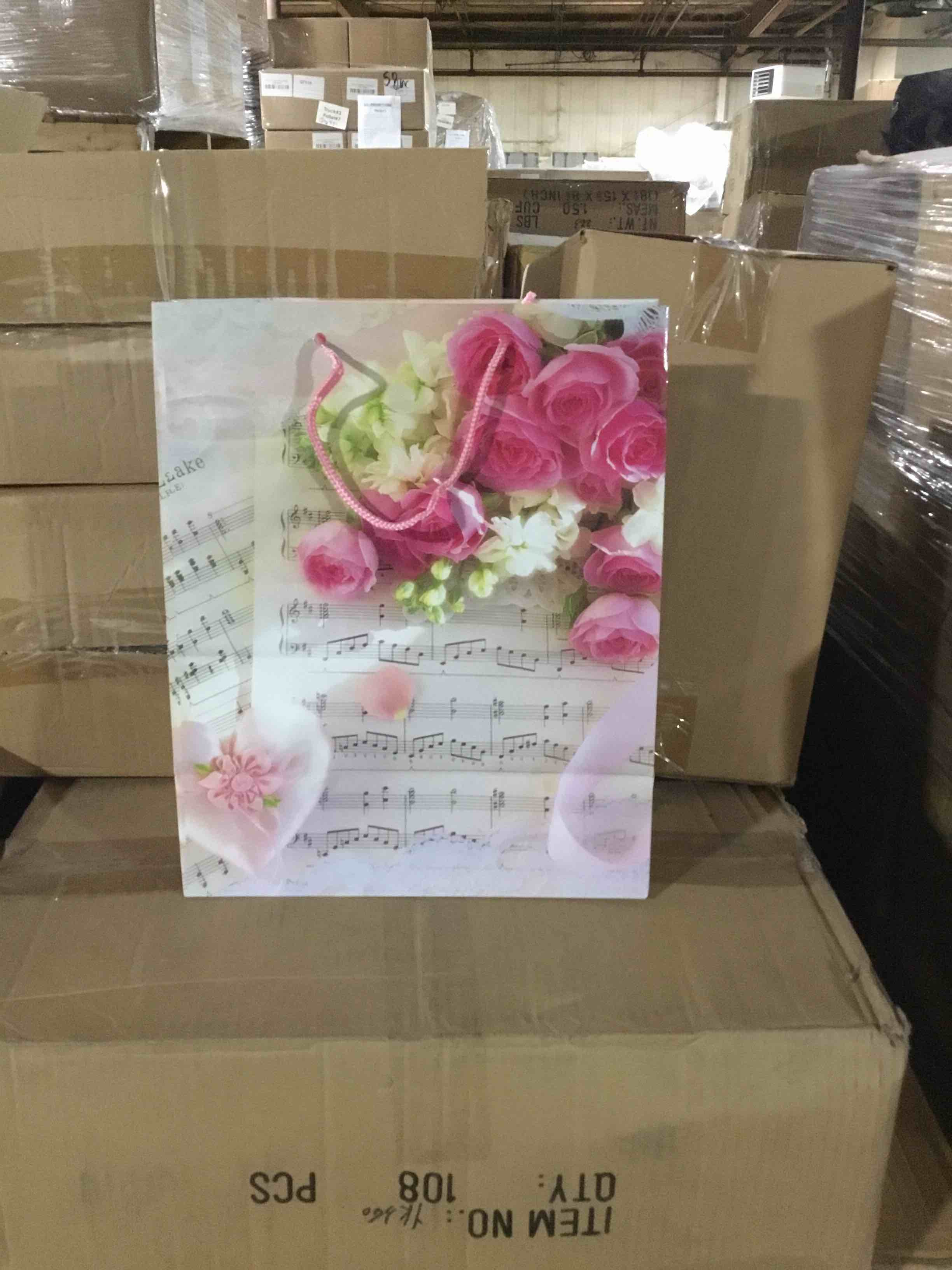 Condition photo showing New/Like New for Box of 108 large gift bags with roses and musical notes