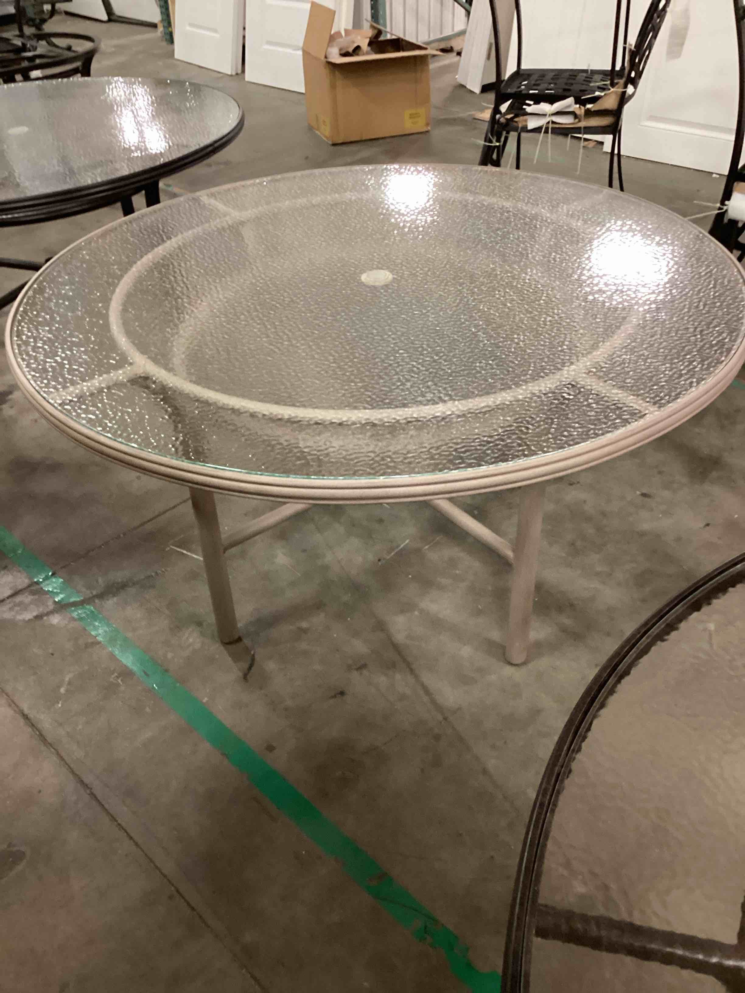 https://s3.amazonaws.com/lotting-images-prod/roundpatiotablebeige_1752179265498.jpeg