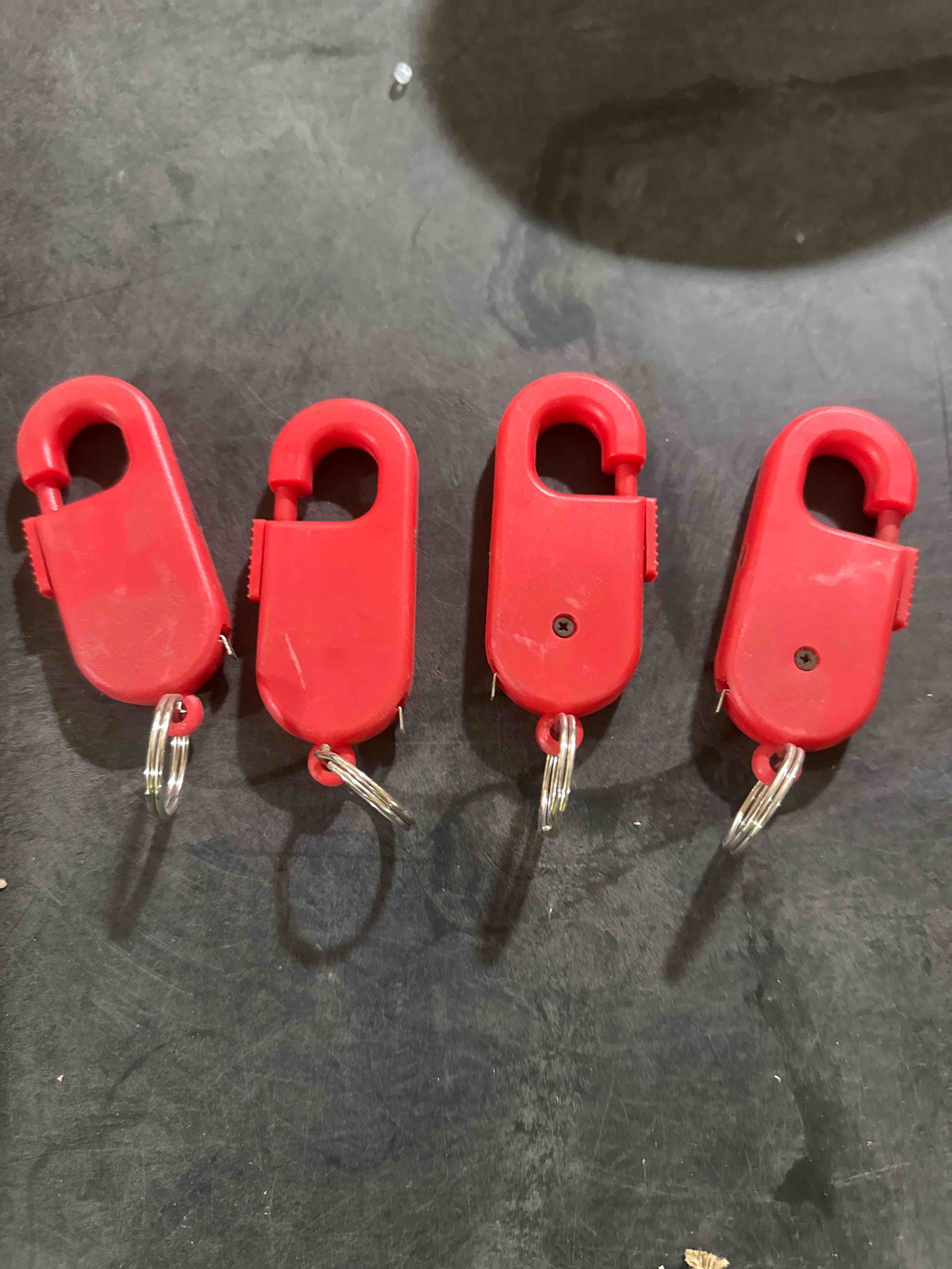 Condition photo showing New/Like New for pack of 4 mini retractable tape measure keychain
