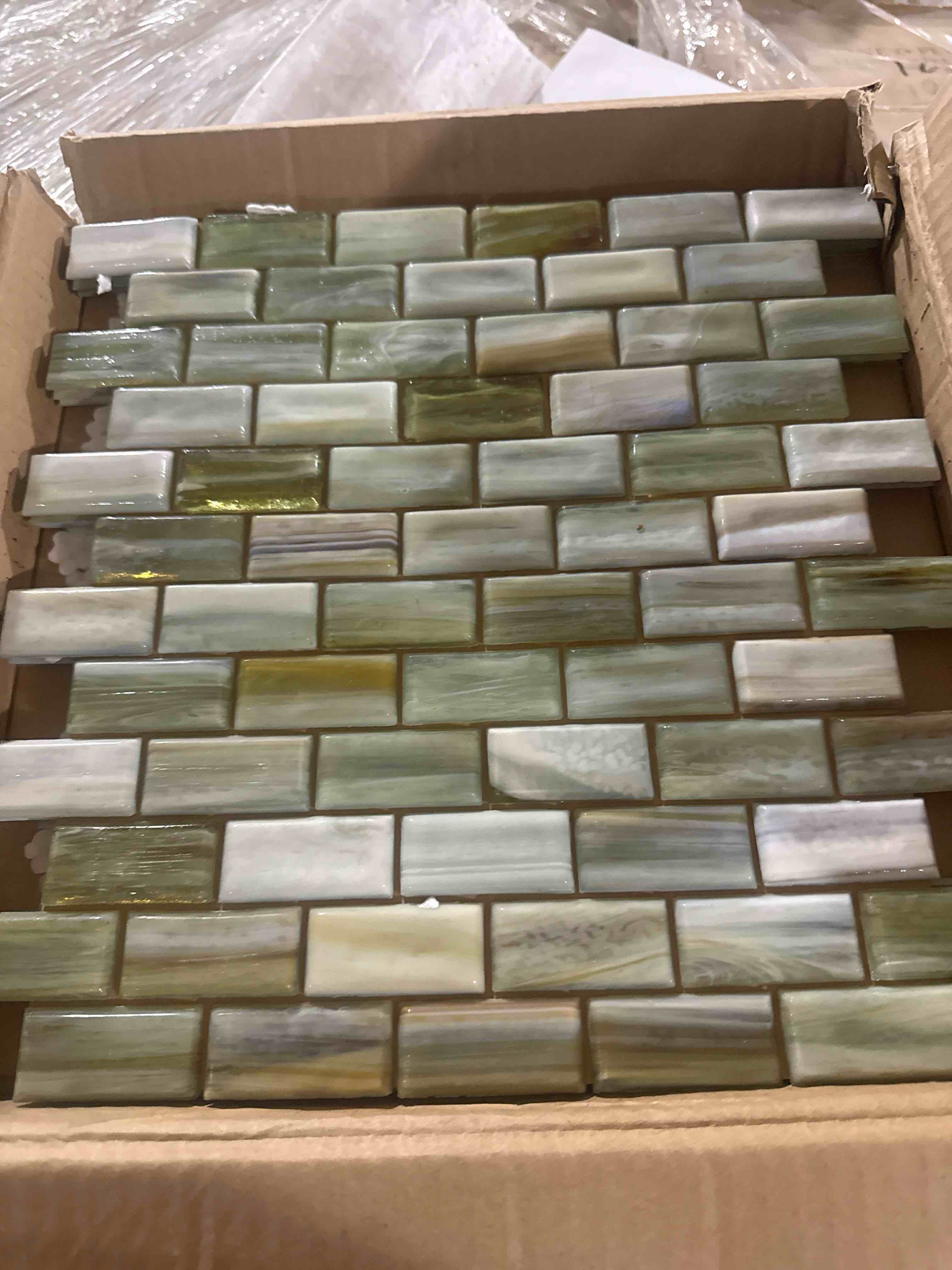 Condition photo showing New/Like New for stone & pewter accents 1x2 brick venezia pearl wall tile 12x12 sheet - bid per sq ft