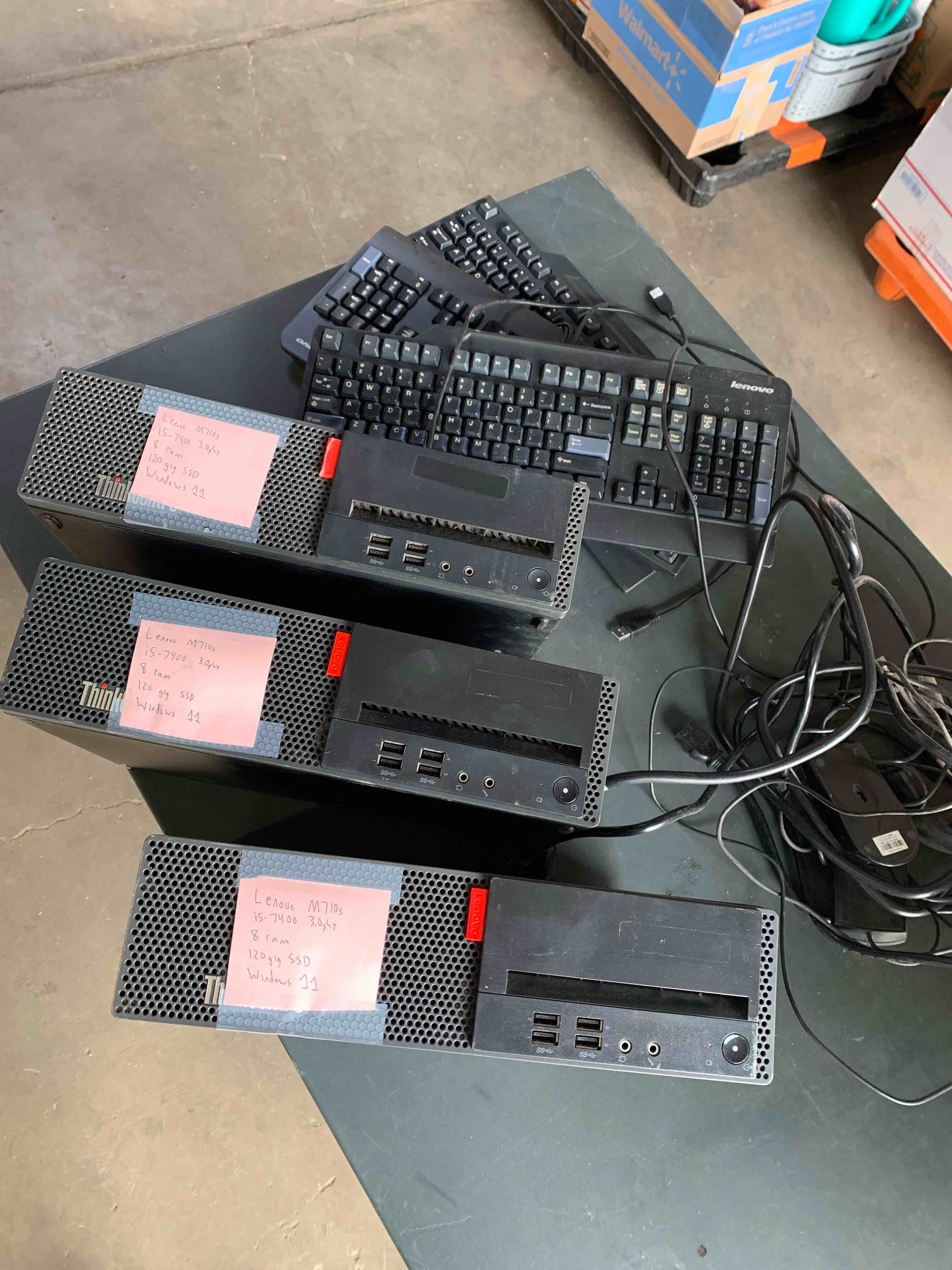 Lenovo ThinkCentre M710s With Lenovo Keyboards Along With Power Wires and A Mouse 
