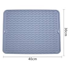 This dish drying mat features a raised stripe design that boosts airflow and drainage, helping dishes dry faster while keeping the kitchen counter clean, dry, and protected.