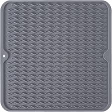 This dish drying mat features a raised stripe design that boosts airflow and drainage, helping dishes dry faster while keeping the kitchen counter clean, dry, and protected.