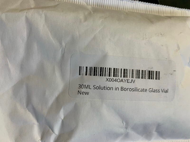 30ml solution in borosilicate glass vial