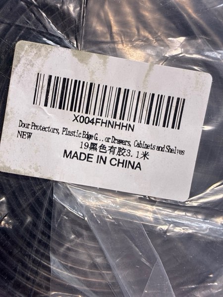 Condition photo showing New/Like New for Cabinet Door Edge Protectors, 3/4" Flexible Self Adhesive Rubber Edge Guard, Baby Safe Edge Protectors for Drawers, Cabinets, Shelves, Desks and Counter Tops, Black, 10FT