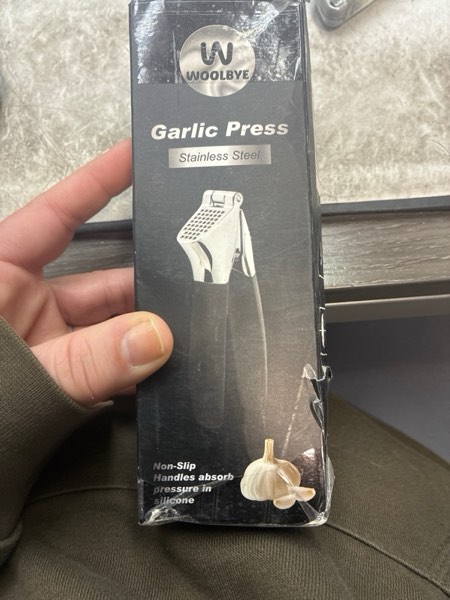 Condition photo showing New/Like New for 4-in-1 Garlic Press Set - Stainless Steel Garlic Press, Garlic Press, Chopper, Grinder, Grater, Mincer with Peeler, Silicone Tube Roller, Brush and Knife - The Essential Garlic Mincing Kit