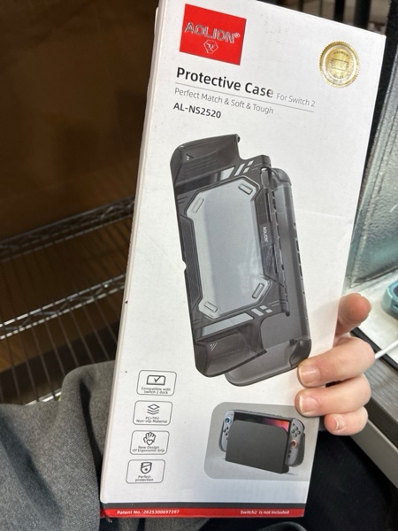 Condition photo showing New/Like New for LuxiSync TPU Protective Case for Switch 2 Console – Ergonomic Carbon Fiber Grip, Shock-Absorbing Cover, 2 Screen Protectors, Thumb Grips & Dust Plugs