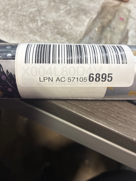 Condition photo showing item condition for Christmas Wrapping Paper Roll - Silver Gift Wrap with Christmas Tree, Berry, Snowflake - Perfect for Christmas