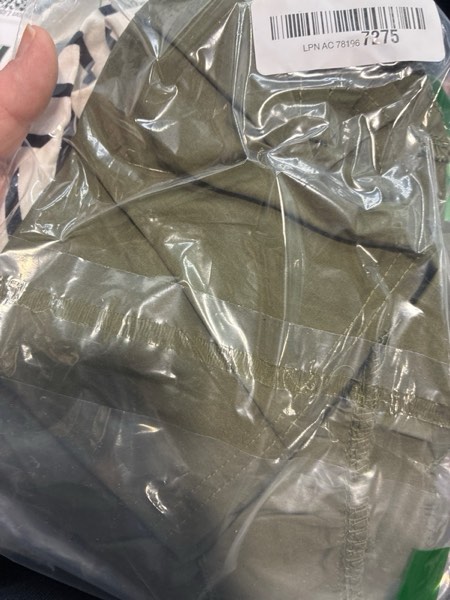 Condition photo showing New/Like New for MYSTERY ITEM Clothes