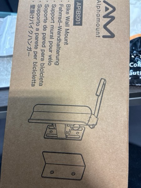 Condition photo showing New/Like New for Alphamount AM Swivel Bike Wall Mount, Metal Wall Bike Rack with Durable Sleeves, Space-Saving Vertical Bike Rack with 180° Swivel for Home and Garage, Bike Storage Hanger Mount Up to 66 lbs, 1-Pack 1 Pack