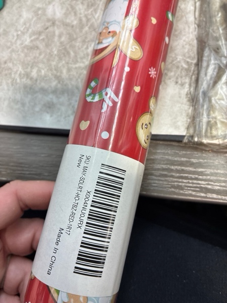 Condition photo showing New/Like New for MAYPLUSS Red Christmas Wrapping Paper Roll - 17IN X 33FT - Santa Gift Wrapping Paper Featuring Santa Claus Gingerbread Christmas Tree HO Candy Cane Reversible Gold for Kids, Holiday, New Year Red Santa Head
