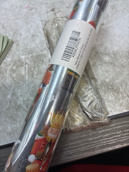 Condition photo showing New/Like New for Flyhill Reversible Christmas Wrapping Paper Roll-17 Inch X 33 Feet - Metallic Silver Foil Nutcracker,Snowflake with Pink Candy Cane Gift Wrap Suitable for Chrsitmas, Holiday, Party,Celebration 17inch*33ft Silver Foil Nutcracker