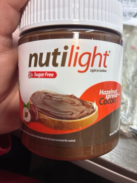 Condition photo showing New/Like New for Nutilight, Hazelnut Spread with Cocoa, Sugar Free, Keto and Diabetic Friendly, Low Net Carb, Non-GMO, Naturally Sweetened with Stevia. (1 Jar, 11 oz) (Bb 09/29/2026)