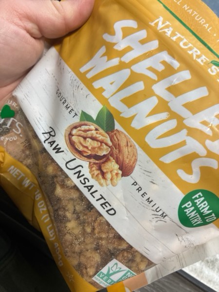 Condition photo showing New/Like New for Nature's Eats Walnut Halves, 16 Oz