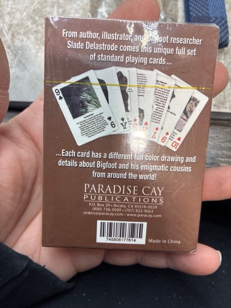 Condition photo showing New/Like New for Paradise Cay Publications, Inc. Squatch METALWORKS Bigfoot Playing Cards - Standard 52 Card Deck - Unique and Fun Playing Cards with Illustrations and Facts - Perfect for Sasquatch Enthusiasts