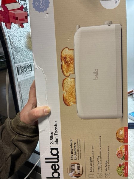 Condition photo showing New/Like New for bella 2 Slice Slim Toaster, Fits-anywhere™ Kitchenware, 6 Setting Shade Control with Reheat & Cancel Buttons, Fits sourdough, 10” Long Slot, Anti Jam & Auto Shutoff, 900 Watt, Oatmilk 2 Slice Oatmilk