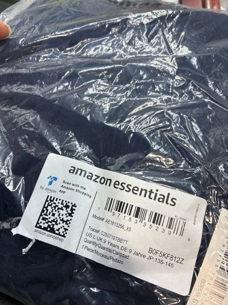 Condition photo showing New/Like New for Amazon Essentials Shirt (Large)