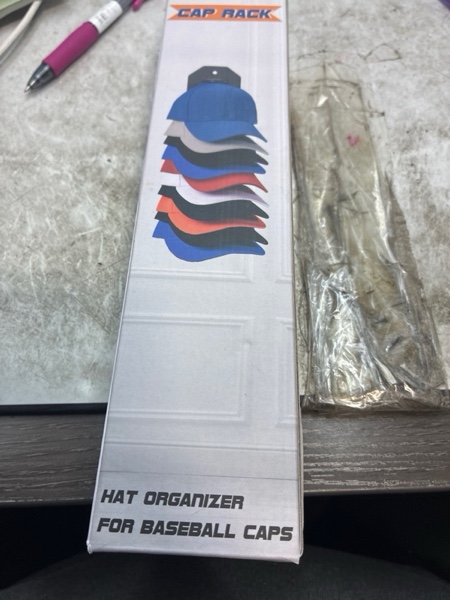 Condition photo showing New/Like New for Hat Organizer for Baseball Caps, 2 Pack Hat Rack for Wall, Wall Mounted Adhesive Cap Rack, Hat Holder Hanger Hold Up to 20 Cap, Baseball Hat Storage Organizer for Door, Closet, Bedroom (White) 2 Pack-White