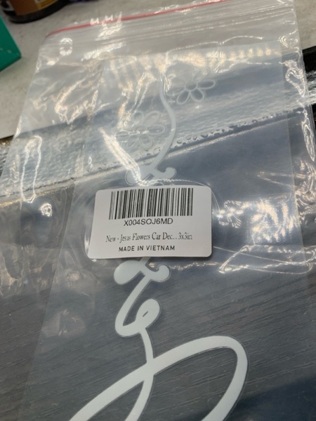 Condition photo showing New/Like New for Christian Decal 7x2.9in – “Jesus” Handwritten Script with Floral Snow Detail – Waterproof White Vinyl Sticker for Car Window, Laptop, Motorcycle – Removable Minimalist Faith Design