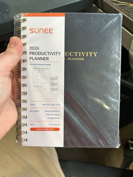 Condition photo showing New/Like New for SUNEE 2026 Planner 5.9" x 8.3" – Dated Productivity Planner for Time Management - Daily,Weekly & Monthly Planner to Achieve Goals - Planner 2026 dated from January 2026 – December 2026,Black Black 5.9" x 8.3"