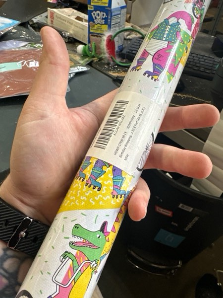 Condition photo showing New/Like New for LeZakaa Dinosaur Wrapping Paper Roll - Colorful Embossed Cartoon Dinosaur Design for Kids Boys Birthday Gift Wrapping with Cut Lines - Mini Roll - 17 inches x 32.8 Feet (46.45 sq.ft.)
