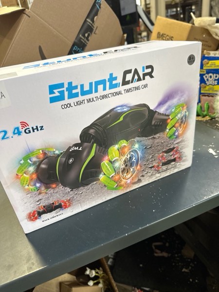 Condition photo showing New/Like New for Eulogia Gesture Control RC Stunt Car with Spray, 1?12 Scale, 360° Rotating Off-Road Drift Vehicle with Lights & Music – Large Size, Ideal for Kids Ages 5-12 (15.35 * 3.74 * 9.45 inches Large Multicolored