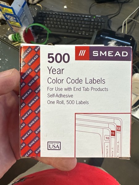Condition photo showing New/Like New for Smead ETYJ Color-Coded Year Labels, 2021, Yellow, 500 Labels per Roll (68321)