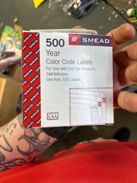 Condition photo showing New/Like New for Smead ETYJ Color-Coded Year Labels, 2021, Yellow, 500 Labels per Roll (68321)