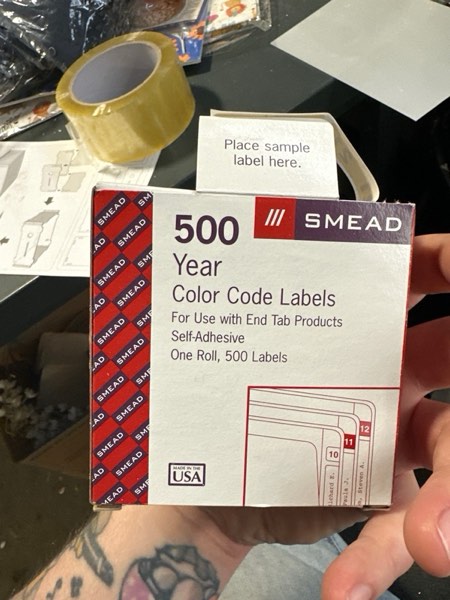 Condition photo showing New/Like New for Smead ETYJ Color-Coded Year Labels, 2021, Yellow, 500 Labels per Roll (68321)
