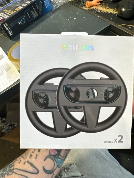 Condition photo showing New/Like New for Uxilep Steering Wheels for Nintendo Switch 2 JoyCons, Racing Wheels for Mario Kart Wolrd 8 Deluxe,2 Pack Switch 2 Mario Kart Steering Wheel for Nintendo Switch 2 (2025) Accessories (Black)