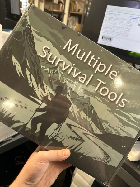 Condition photo showing New/Like New for 2025 Survival Kit Advent Calendar for Men - 24 Days of Premium Outdoor Tools & Emergency Gear,Ultimate Christmas Countdown Gift for Dad, Husband, Teen Boys for Camping, Hiking, Fishing