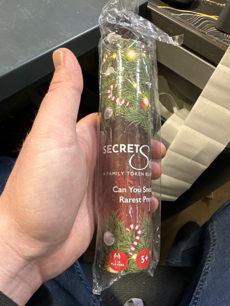 Condition photo showing New/Like New for Secret Santa: A Family Token Bluffing Game. 2-10 Players, Ages 6-92. Quick, Easy, Fast-paced Family Fun.