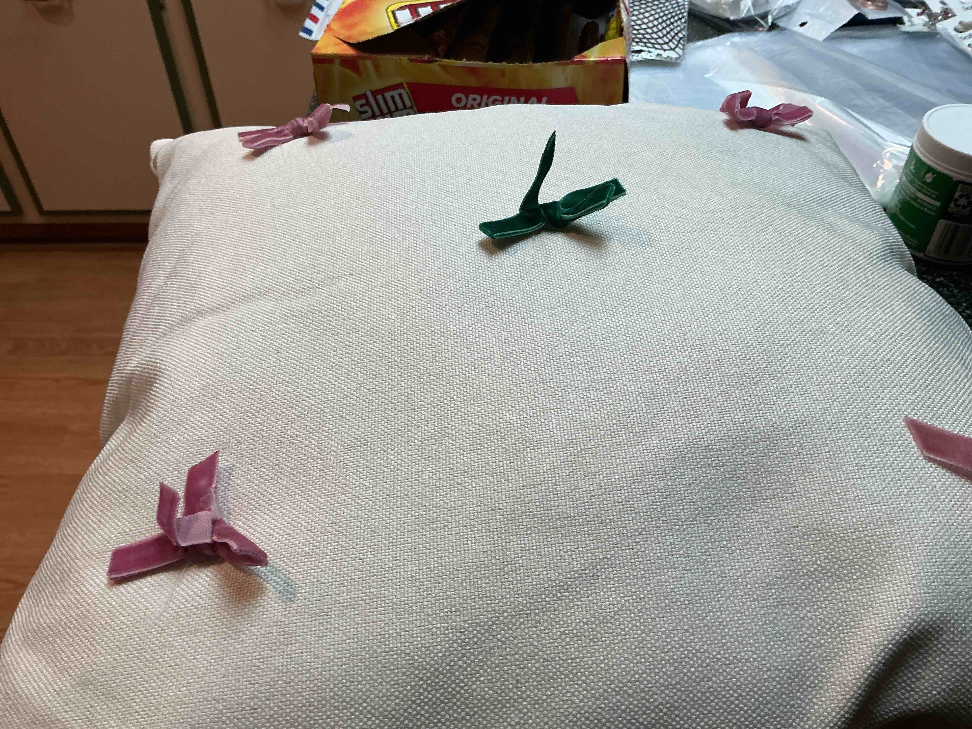 Pillow With Multi Color Ribbons 